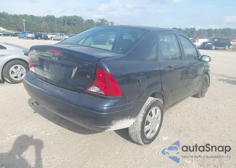2004 Ford Focus Se z USA, uszkodzony, nr VIN 1FAFP34354W113883